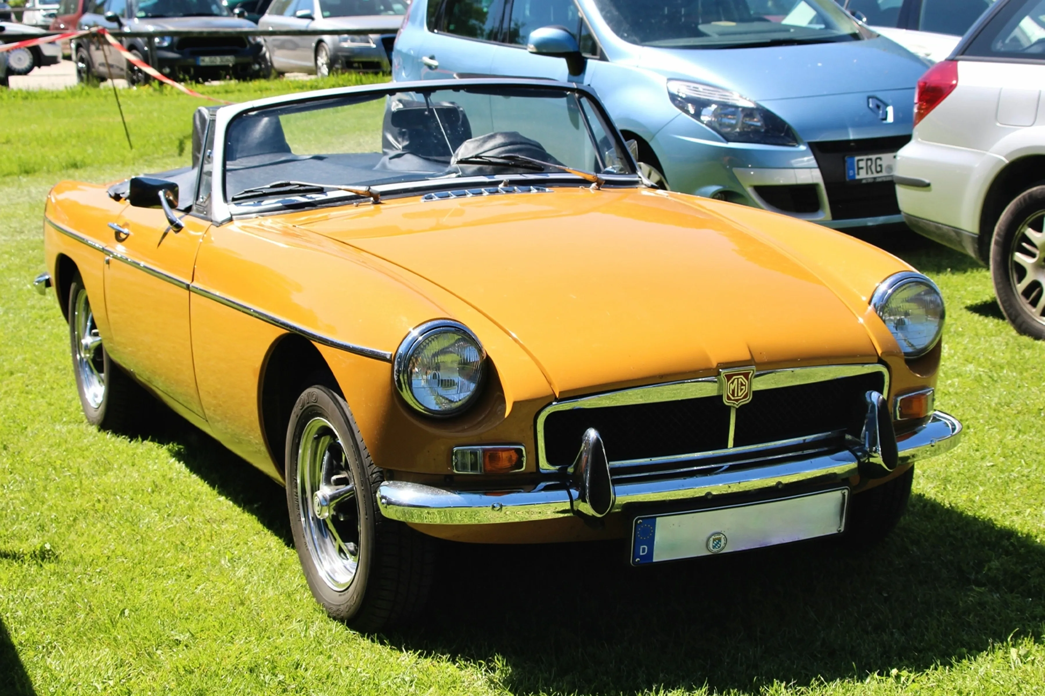 Classic cars on display at a motoring event in the New Forest
